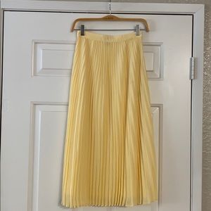 Yellow accordion midi skirt